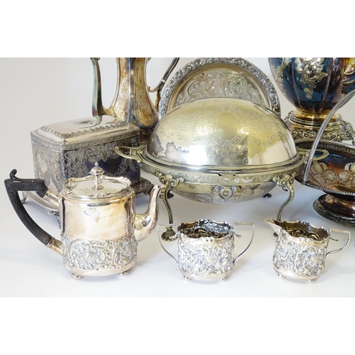 580 - A quantity of 19thC and later silver plated wares to include tea set, spirit kettle, serving dishes,... 