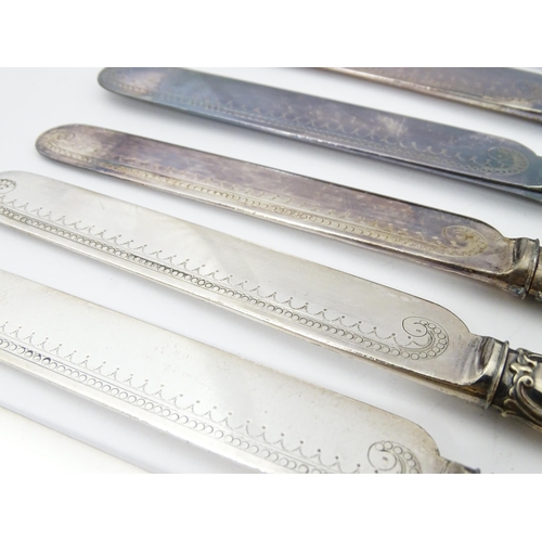 586 - A cased set of six close silver plate fruit knives and forks with mother of pearl handles. 12 1/2