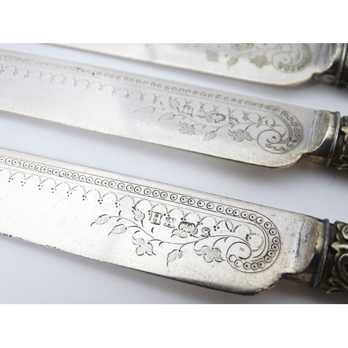 586 - A cased set of six close silver plate fruit knives and forks with mother of pearl handles. 12 1/2