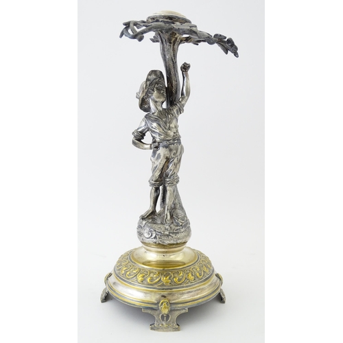 590 - A WMF Art Nouveau silver plate centrepiece formed as a boy under a tree. Approx. 13 1/2