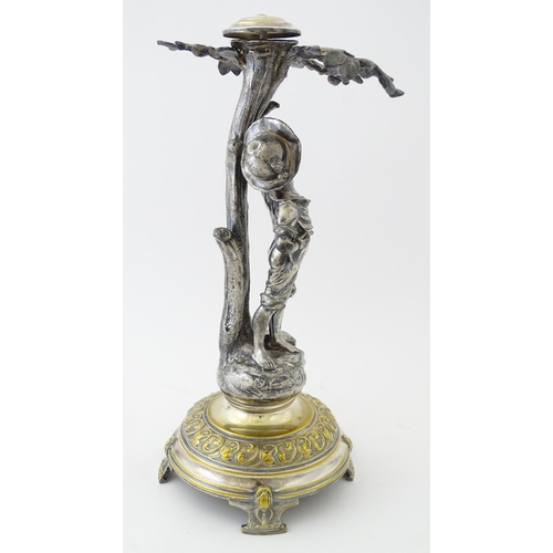 590 - A WMF Art Nouveau silver plate centrepiece formed as a boy under a tree. Approx. 13 1/2