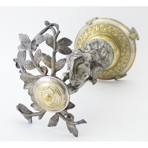 590 - A WMF Art Nouveau silver plate centrepiece formed as a boy under a tree. Approx. 13 1/2