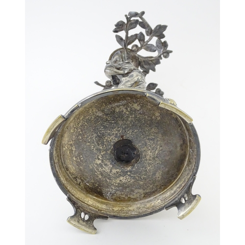 590 - A WMF Art Nouveau silver plate centrepiece formed as a boy under a tree. Approx. 13 1/2