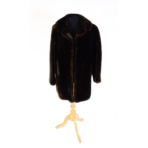 1294 - Vintage fashion / clothing: A brown faux fur coat by Smiths and Sons, Northampton. Chest approx. 38