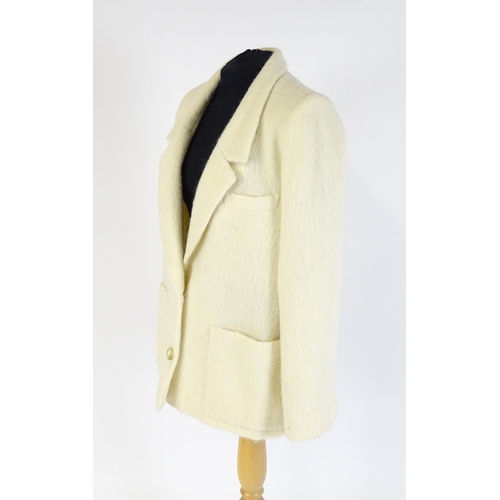 1296 - Vintage fashion / clothing: A Christian Dior Tricots et Coordonnes cream wool and alpaca jacket. Che... 