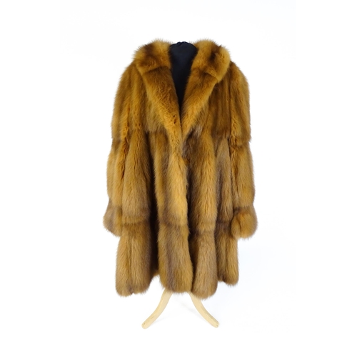 1299 - Vintage fashion / clothing: A vintage fur swing coat labelled Barone, Parma. Chest approx. 44