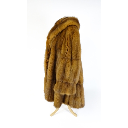 1299 - Vintage fashion / clothing: A vintage fur swing coat labelled Barone, Parma. Chest approx. 44