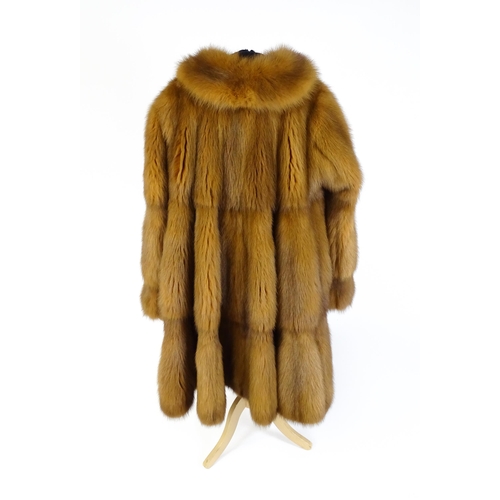 1299 - Vintage fashion / clothing: A vintage fur swing coat labelled Barone, Parma. Chest approx. 44