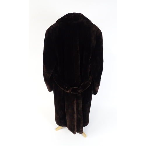 1303 - Vintage fashion / clothing: A dark brown full length fur coat by Barone, Parma. Chest approx. 44