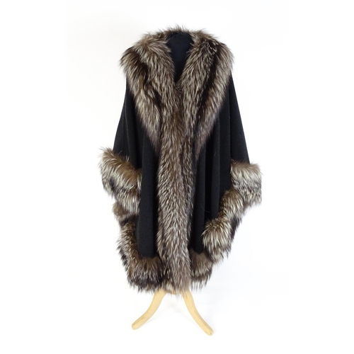 1304 - Vintage fashion / clothing: A dark grey wool and cashmere cloak with fur trim by Barone, Parma