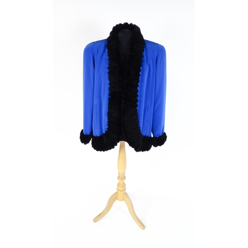 1310 - Vintage fashion / clothing: A cobalt blue jacket / coat with black fur detailing and lining. Bears l... 