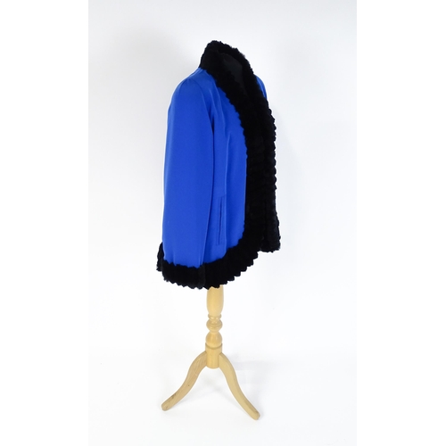 1310 - Vintage fashion / clothing: A cobalt blue jacket / coat with black fur detailing and lining. Bears l... 