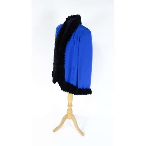 1310 - Vintage fashion / clothing: A cobalt blue jacket / coat with black fur detailing and lining. Bears l... 