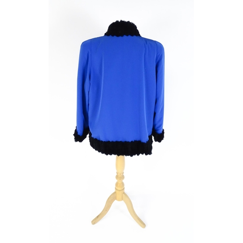 1310 - Vintage fashion / clothing: A cobalt blue jacket / coat with black fur detailing and lining. Bears l... 