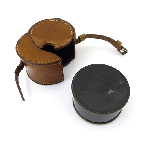 1177 - A late 19thC cased brass pocket drum sextant, the interior lid with tangential measurement table. Ap... 