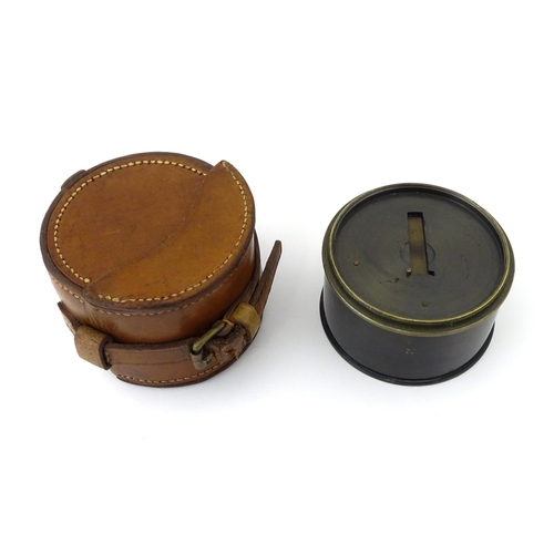 1177 - A late 19thC cased brass pocket drum sextant, the interior lid with tangential measurement table. Ap... 