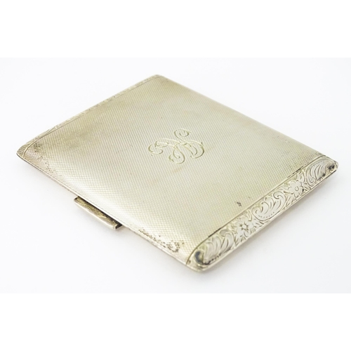 277 - A Continental .925 silver cigarette case with engine turned decoration and acanthus scroll banding. ... 