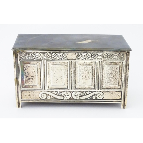 288 - A novelty silver cigarette box formed as a coffer. Hallmarked Sheffield 1910 maker Thomas Bradbury &... 