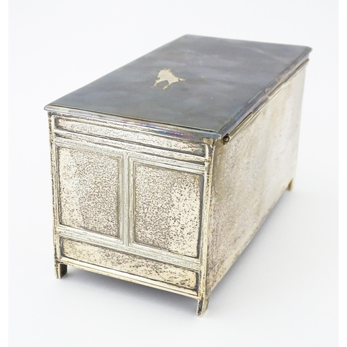 288 - A novelty silver cigarette box formed as a coffer. Hallmarked Sheffield 1910 maker Thomas Bradbury &... 