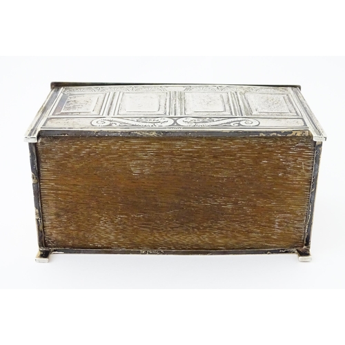 288 - A novelty silver cigarette box formed as a coffer. Hallmarked Sheffield 1910 maker Thomas Bradbury &... 