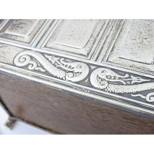 288 - A novelty silver cigarette box formed as a coffer. Hallmarked Sheffield 1910 maker Thomas Bradbury &... 