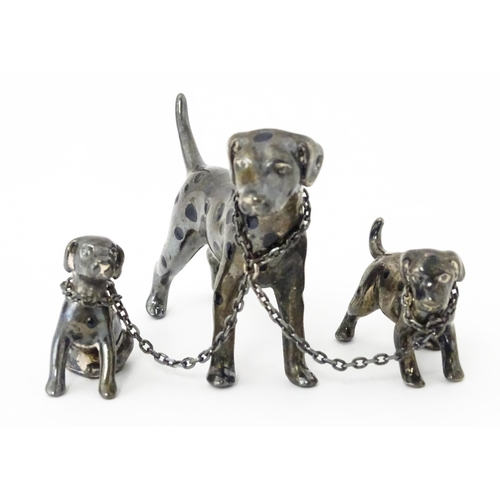 294 - A Continental silver model of a Dalmatian dog with two puppies. Approx 2 1/2