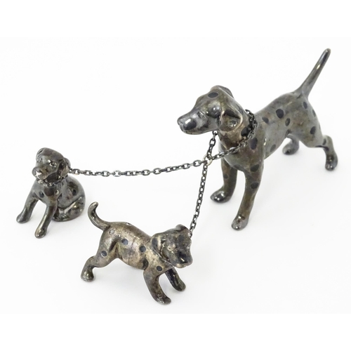 294 - A Continental silver model of a Dalmatian dog with two puppies. Approx 2 1/2