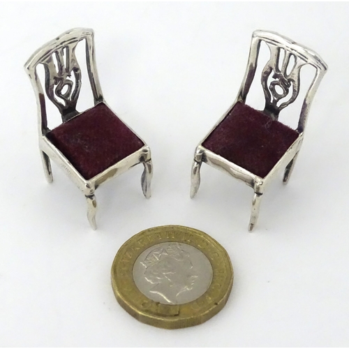 302 - Two .925 silver novelty pin cushions formed as a pair of chairs. Approx 1 1/4