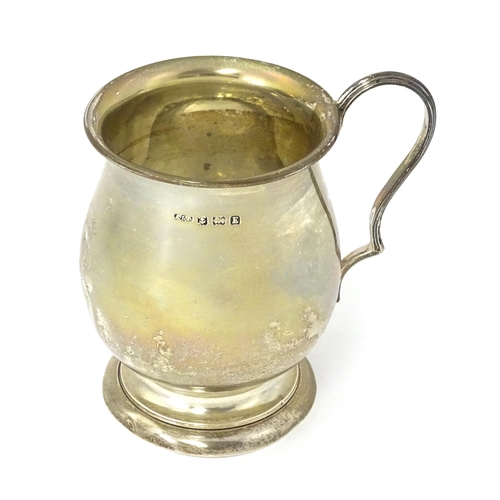 305 - A silver Christening mug, hallmarked Birmingham 1929, maker A L Davenport Ltd. Approx. 3 1/2