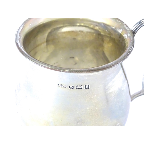 305 - A silver Christening mug, hallmarked Birmingham 1929, maker A L Davenport Ltd. Approx. 3 1/2