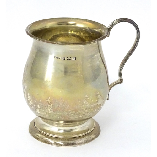 305 - A silver Christening mug, hallmarked Birmingham 1929, maker A L Davenport Ltd. Approx. 3 1/2