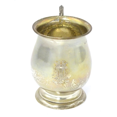 305 - A silver Christening mug, hallmarked Birmingham 1929, maker A L Davenport Ltd. Approx. 3 1/2