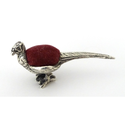 306 - A .925 silver novelty pin cushion formed as a pheasant. Approx 1 3/4