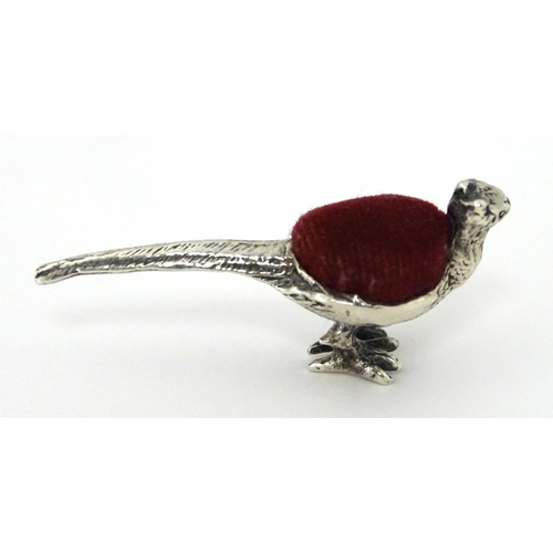 306 - A .925 silver novelty pin cushion formed as a pheasant. Approx 1 3/4