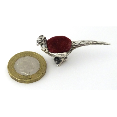 306 - A .925 silver novelty pin cushion formed as a pheasant. Approx 1 3/4