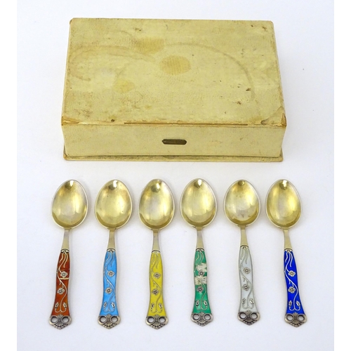 308 - Scandinavian Silver: A set of six Norwegian silver gilt teaspoons with guilloche enamel decoration t... 