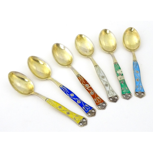 308 - Scandinavian Silver: A set of six Norwegian silver gilt teaspoons with guilloche enamel decoration t... 