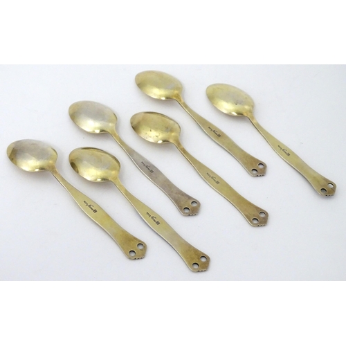 308 - Scandinavian Silver: A set of six Norwegian silver gilt teaspoons with guilloche enamel decoration t... 