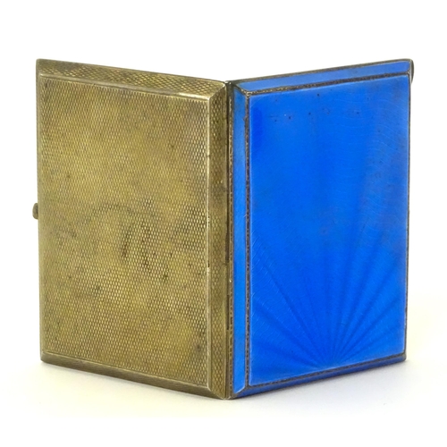 310 - An Art Deco silver cigarette case with blue guilloche enamel decoration and gilded interior, hallmar... 