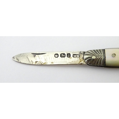 317 - A Victorian silver folding fruit knife with mother of pearl handle, hallmarked Sheffield 1896, maker... 