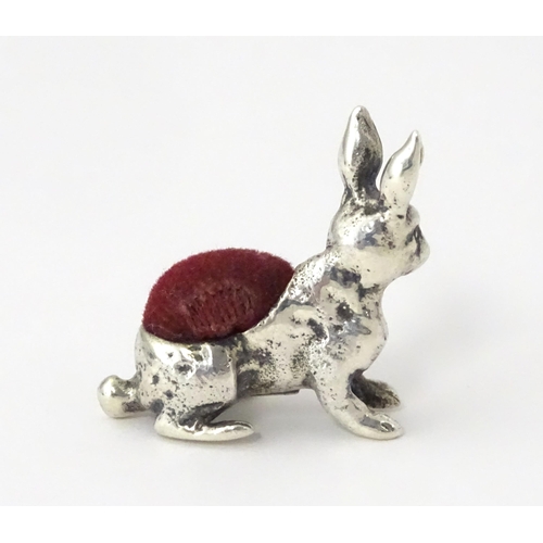 318 - A .925 silver novelty pin cushion formed as a hare. Approx. 1