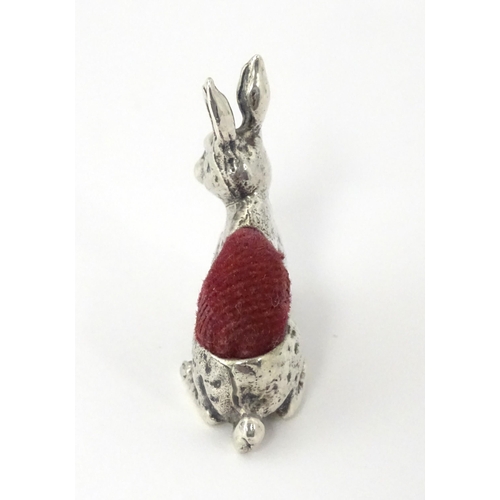 318 - A .925 silver novelty pin cushion formed as a hare. Approx. 1