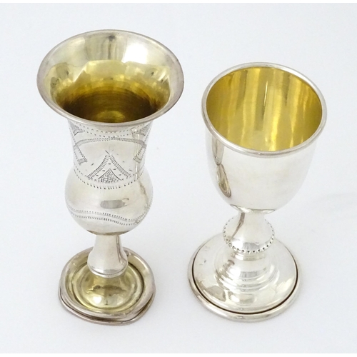 324 - A silver kiddush cup hallmarked Birmingham 1910, maker Jacob Fenigstein. Together with a silver pede... 