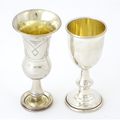 324 - A silver kiddush cup hallmarked Birmingham 1910, maker Jacob Fenigstein. Together with a silver pede... 