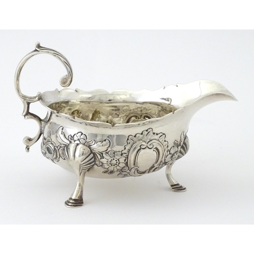 326 - A George II silver sauce boat hallmarked London 1755, maker Robert Albin Cox. Approx. 3