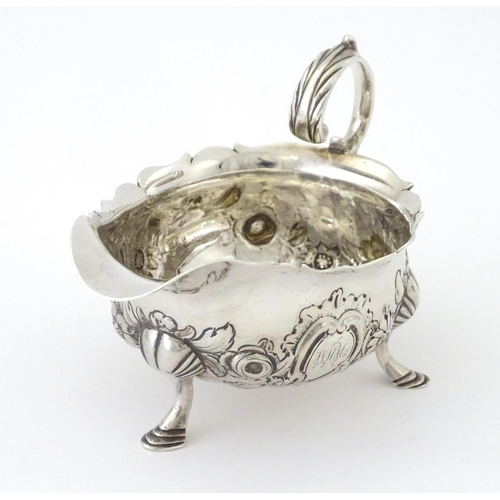 326 - A George II silver sauce boat hallmarked London 1755, maker Robert Albin Cox. Approx. 3