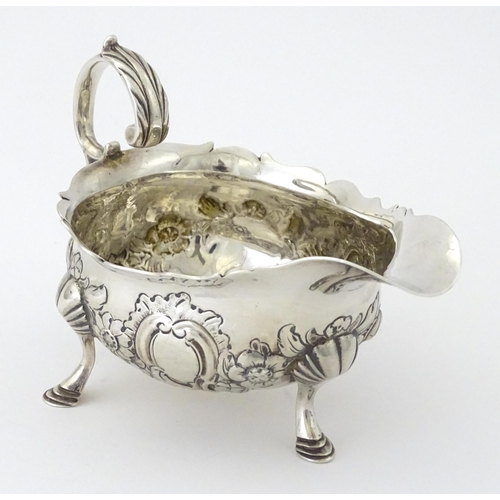 326 - A George II silver sauce boat hallmarked London 1755, maker Robert Albin Cox. Approx. 3