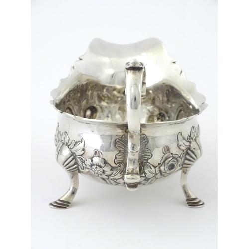 326 - A George II silver sauce boat hallmarked London 1755, maker Robert Albin Cox. Approx. 3