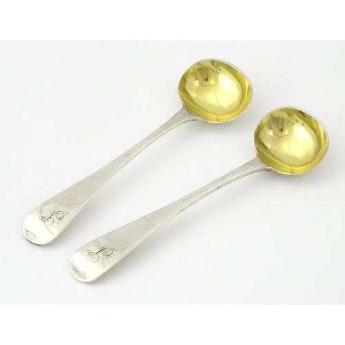 329 - A pair of silver salt spoons hallmarked London 1832, maker James Payne. Approx. 4