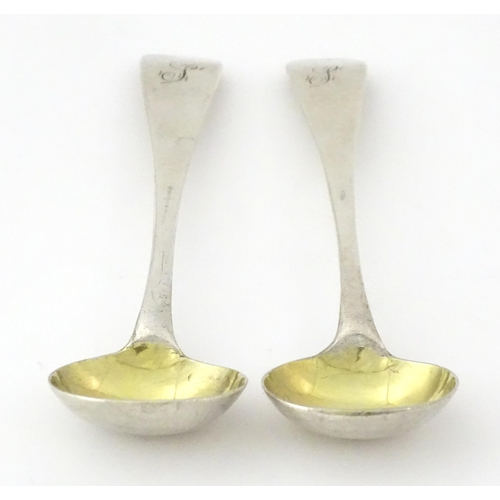 329 - A pair of silver salt spoons hallmarked London 1832, maker James Payne. Approx. 4